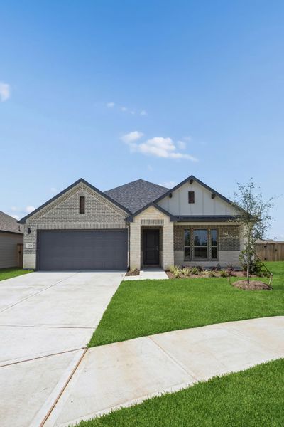 Front exterior of a new home in Riviera Pines, Huffman, TX, highlighting curb appeal (Image 24).