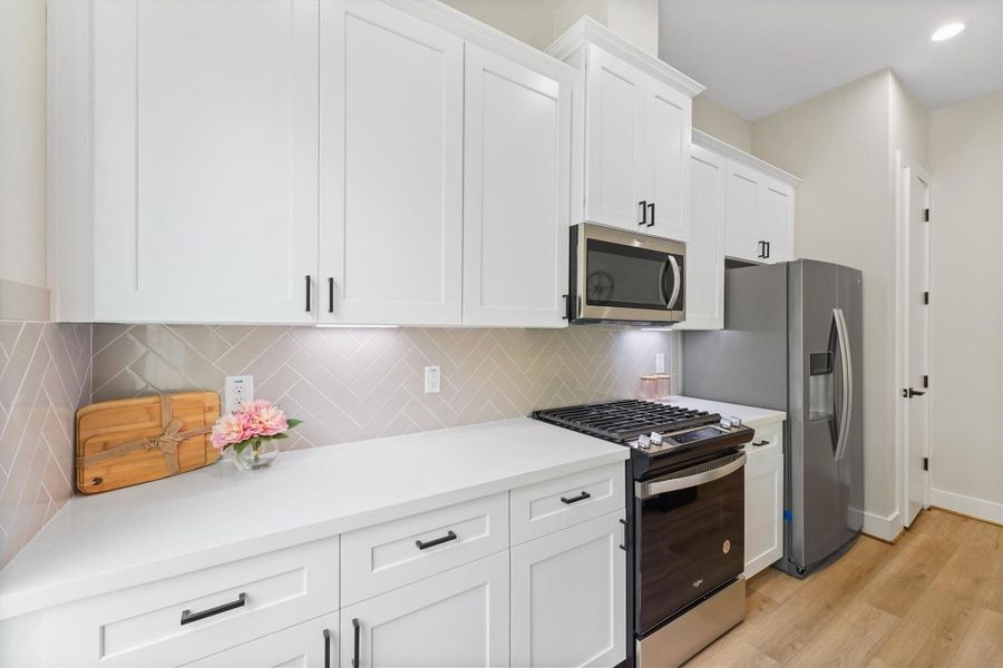 Furnished interior view inside a new home in Blalock Square, Houston (Image 14).