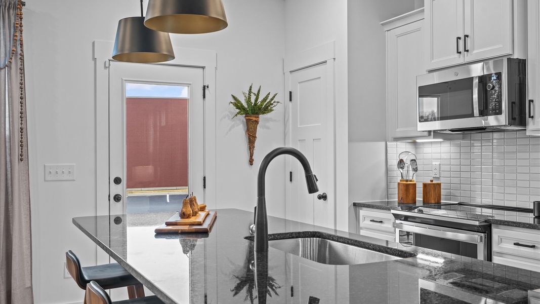 Representative furnished interior of a home built from the Corner Litchfield by DRB Homes in Gresham Station, Simpsonville (Image 11).