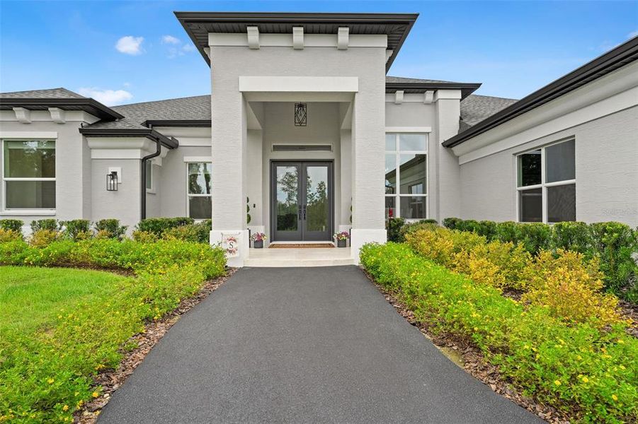 Front exterior of a new home in , Homosassa, FL, highlighting curb appeal (Image 31). Front exterior of a new home in , Homosassa, FL, highlighting curb appeal (Image 31).