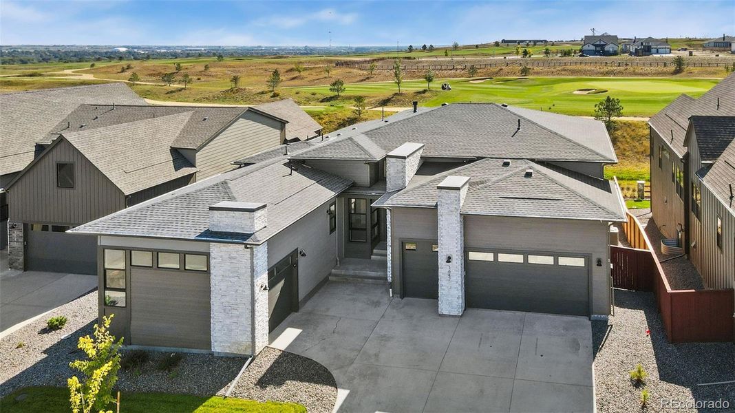 Front exterior of a new home in The Fairways at RainDance, Windsor, CO, highlighting curb appeal (Image 2).