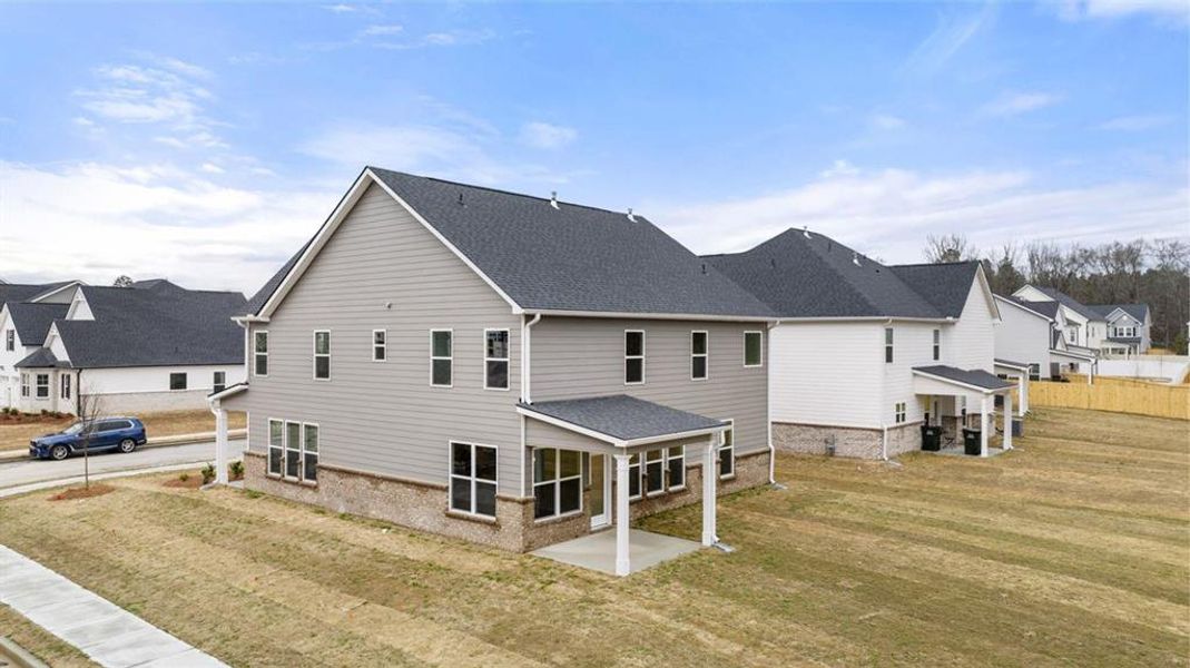 Exterior details and patio area of a home in Wildwood, Covington (Image 19).
