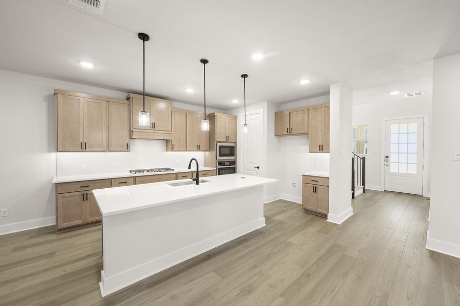 Furnished interior view inside a new home in Terrace Collection at Harvest, Argyle (Image 6).