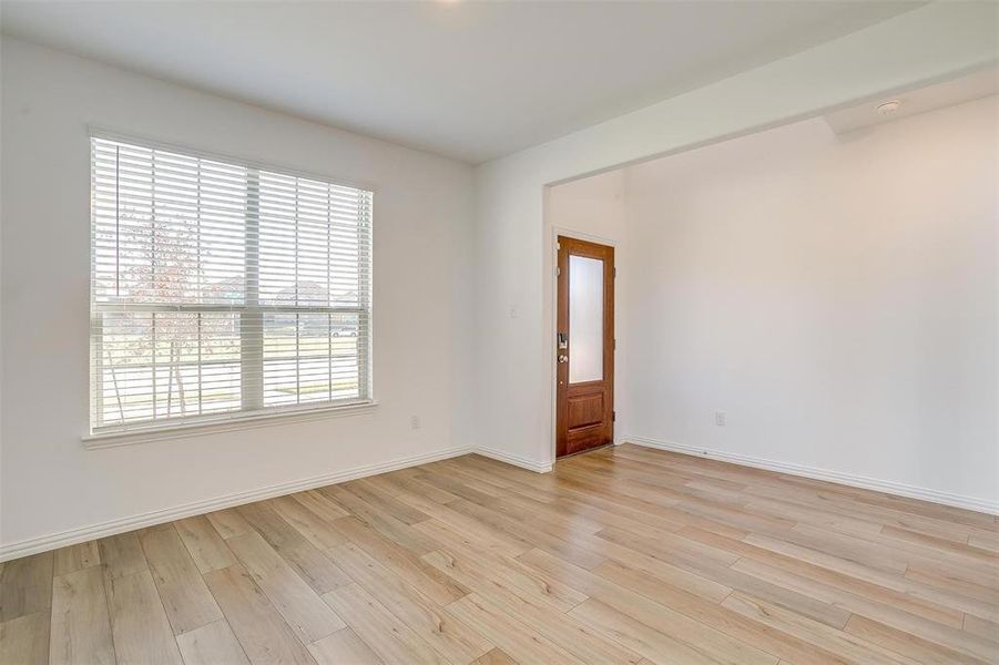 Spare room featuring light hardwood / wood-style floors