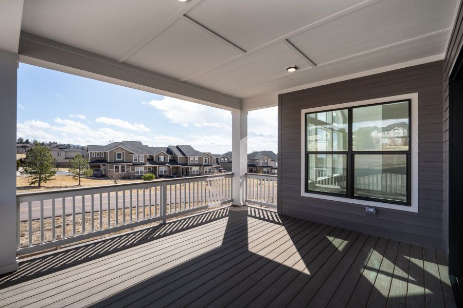 Exterior details and patio area of a home in Cloverleaf - Pinnacle Collection, Monument (Image 4).