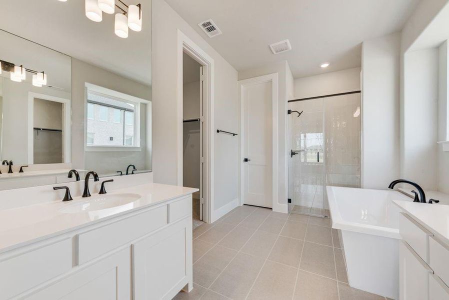 Furnished interior view inside a new home in Trails at Cottonwood Creek, Fate (Image 7).