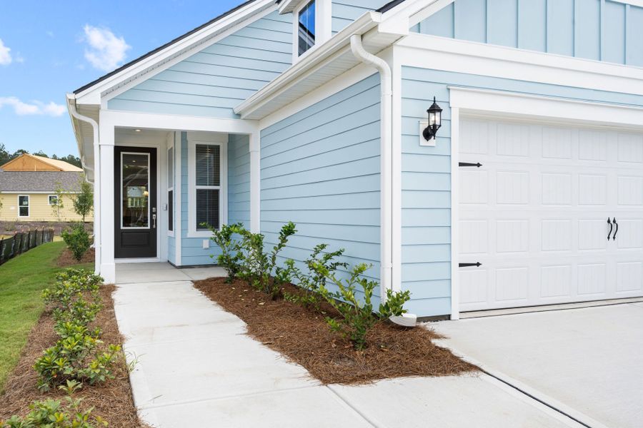 Exterior details and patio area of a home in Del Webb Savannah at Heartwood, Richmond Hill (Image 31). Exterior details and patio area of a home in Del Webb Savannah at Heartwood, Richmond Hill (Image 31).