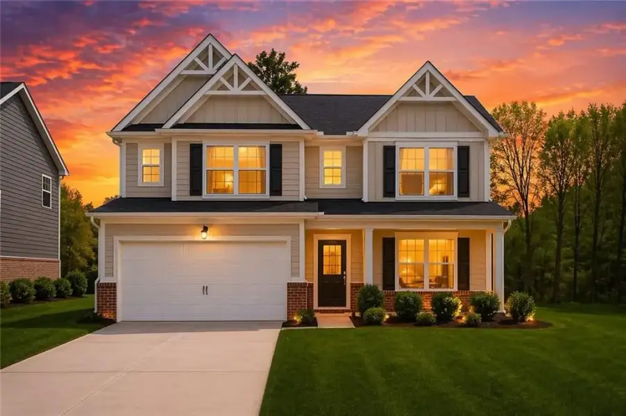Front exterior of a new home in The Hills at Cedar Creek, Winder, GA, highlighting curb appeal (Image 21).