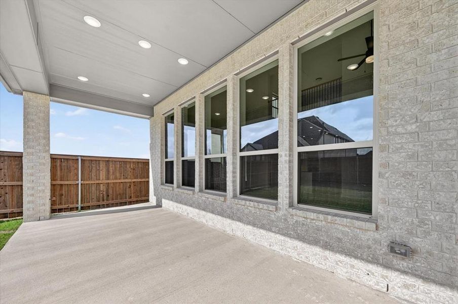 Exterior details and patio area of a home in Cambridge Crossing, Celina (Image 2).