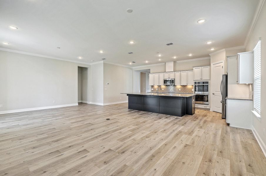 Spacious, unfurnished interior of a new home in K. Hovnanian's® Four Seasons at Lakes of Cane Bay, Summerville (Image 17).