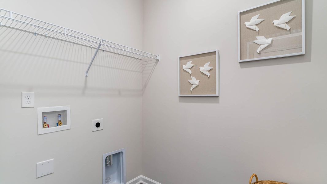 Representative furnished interior of a home built from the KERRY by D.R. Horton in Sutton Farm, Loris (Image 13).