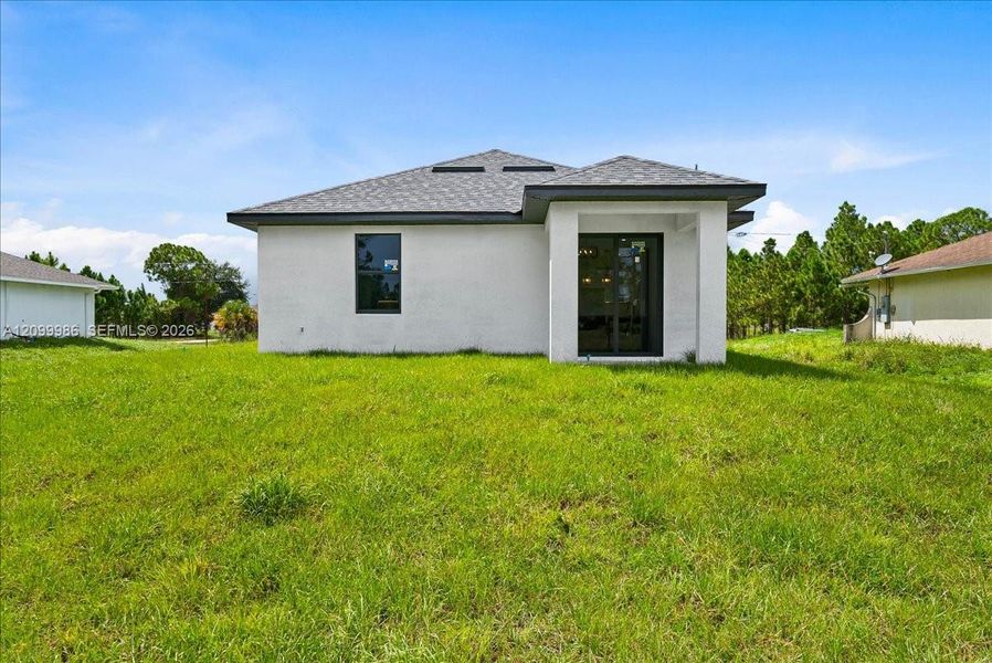 Exterior details and patio area of a home in , Lehigh Acres (Image 16).