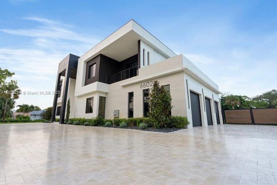 Front exterior of a new home in , Parkland, FL, highlighting curb appeal (Image 16). Front exterior of a new home in , Parkland, FL, highlighting curb appeal (Image 16).