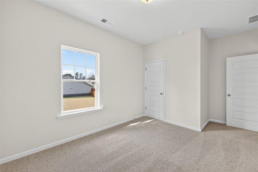 Spacious, unfurnished interior of a new home in Garrett Preserve, Douglasville (Image 29).