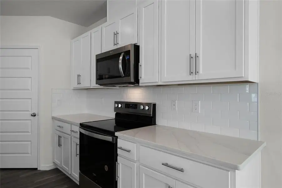 Furnished interior view inside a new home in Harmony at Lake Eloise, Winter Haven (Image 8). Furnished interior view inside a new home in Harmony at Lake Eloise, Winter Haven (Image 8).