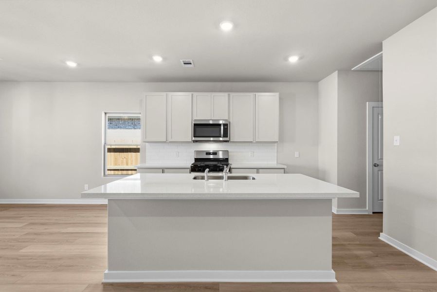 Furnished interior view inside a new home in Windrose Green, Angleton (Image 7).