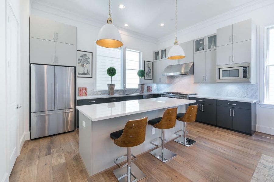 Upgraded appliance package with Fisher and Paykel double drawer dishwasher.  Stack cabinets that are furniture grade quality.