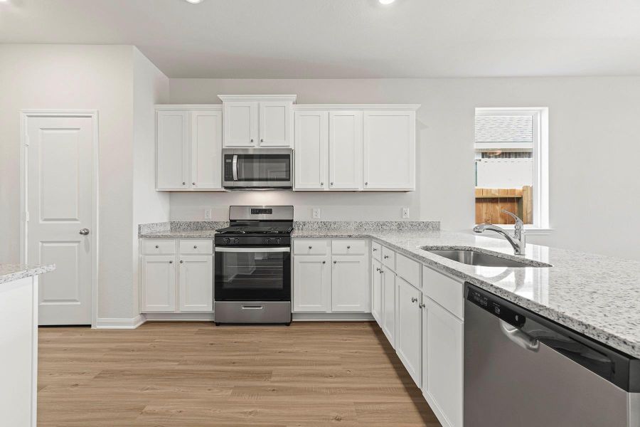 Furnished interior view inside a new home in Emberly, Beasley (Image 6).