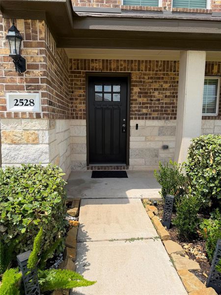 Exterior details and patio area of a home in Sunterra, Katy (Image 3). Exterior details and patio area of a home in Sunterra, Katy (Image 3).