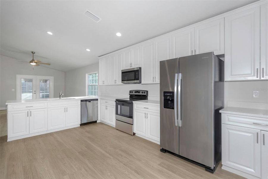 Furnished interior view inside a new home in , New Port Richey (Image 12).