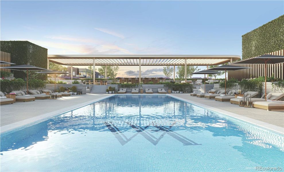 Resort-style rooftop pool deck with bar and lounge areas