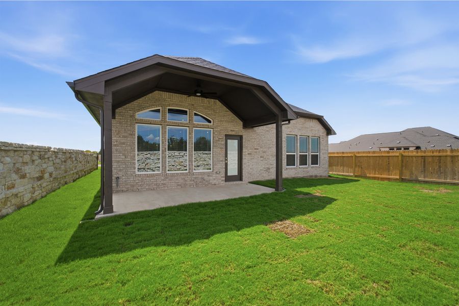 Exterior details and patio area of a home in Santa Rita Ranch, Liberty Hill (Image 4).