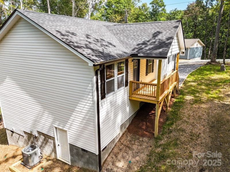 Front exterior of a new home in , Etowah, NC, highlighting curb appeal (Image 1). Front exterior of a new home in , Etowah, NC, highlighting curb appeal (Image 1).