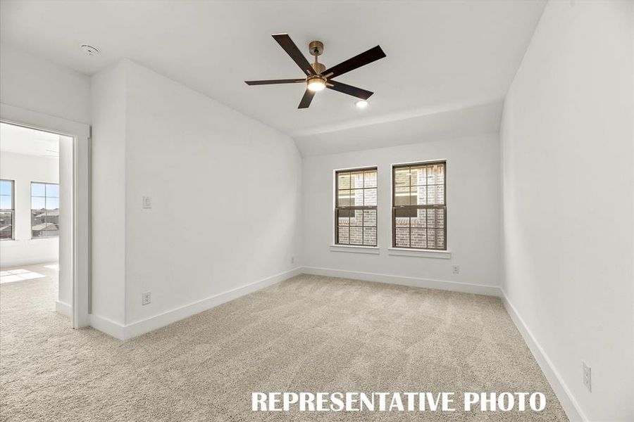 The loft at the top of the stairs is offers a great space for a second family living area or game room.  REPRESENTATIVE PHOTO