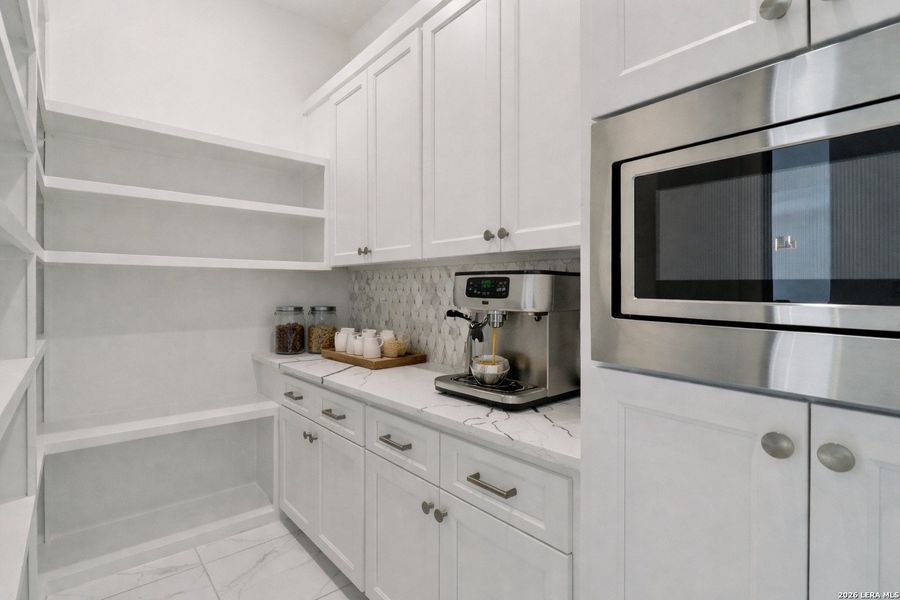 Furnished interior view inside a new home in , San Antonio (Image 52).