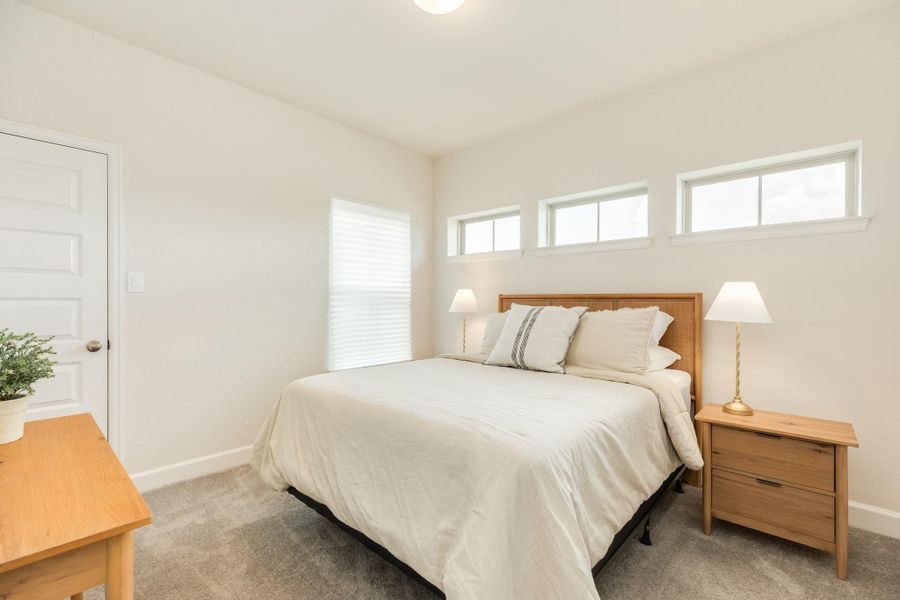 Spacious upstairs secondary bedroom featuring plush, like-new carpeting and an oversized closet. Spacious upstairs secondary bedroom featuring plush, like-new carpeting and an oversized closet.