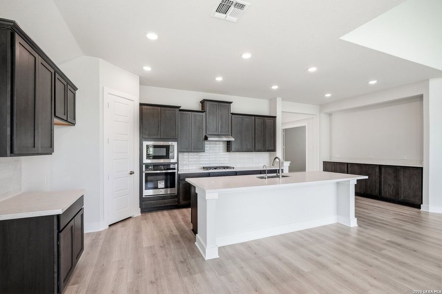 Furnished interior view inside a new home in Esperanza 50's, Boerne (Image 8).