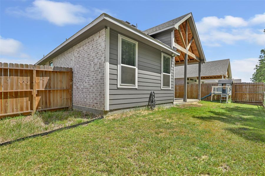 Exterior details and patio area of a home in , Anahuac (Image 25).