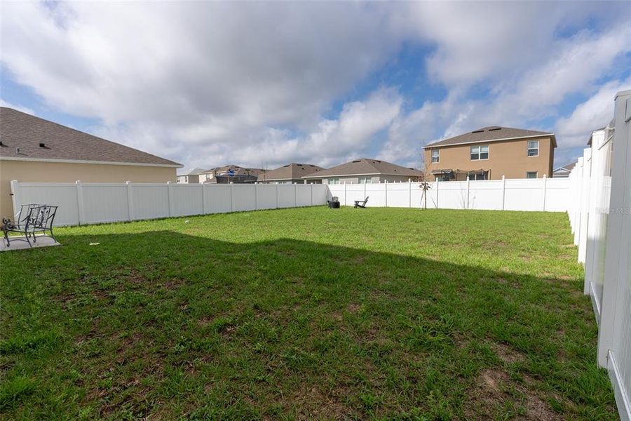 Exterior details and patio area of a home in Harmony at Lake Eloise, Winter Haven (Image 25).
