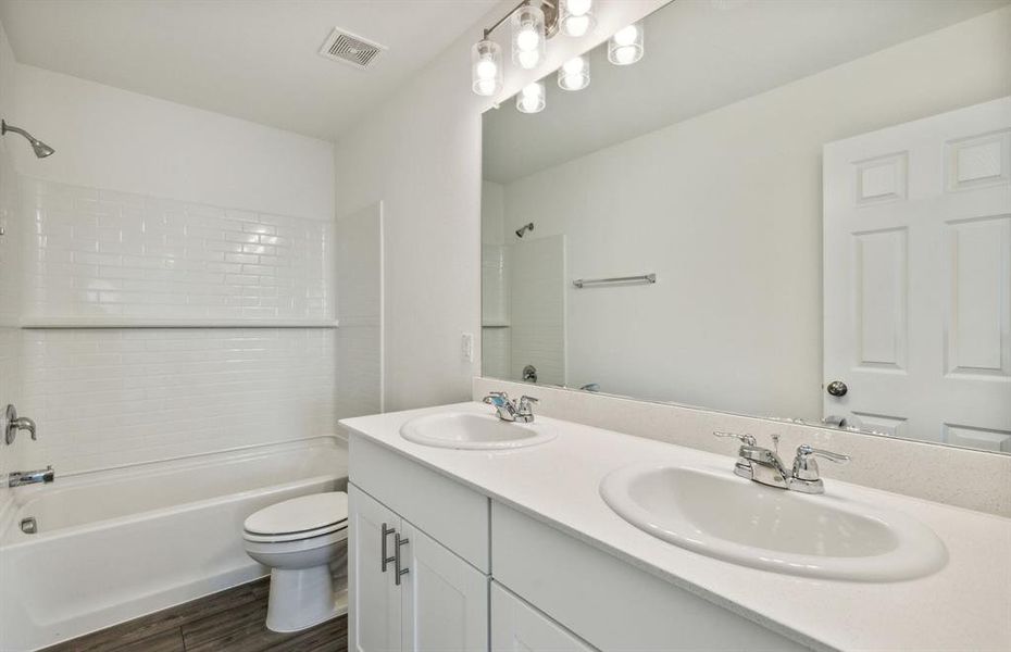 Upgraded secondary bathroom*real home pictured