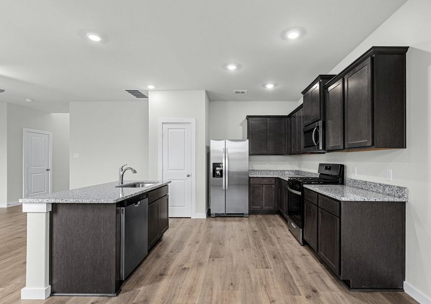 The kitchen has sprawling granite countertops. The kitchen has sprawling granite countertops.
