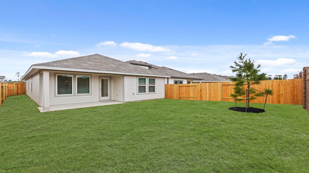 Exterior details and patio area of a home in Presswoods, Splendora (Image 4).