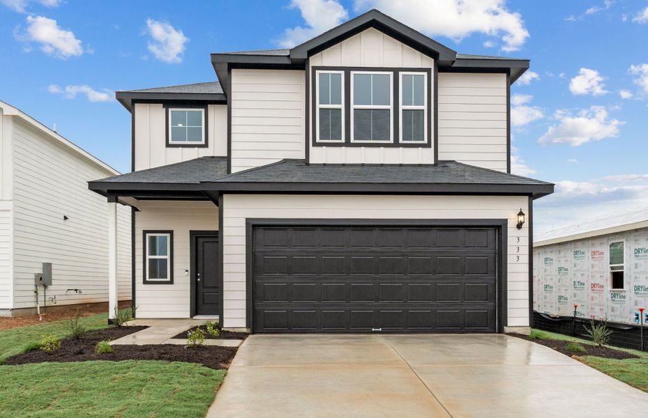 Front exterior of a new home in Larson Crossing, Elgin, TX, highlighting curb appeal (Image 17).