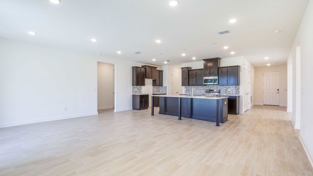 Representative unfurnished interior of a home built from the Naples by Maronda Homes in Golden Gate, Naples (Image 12).