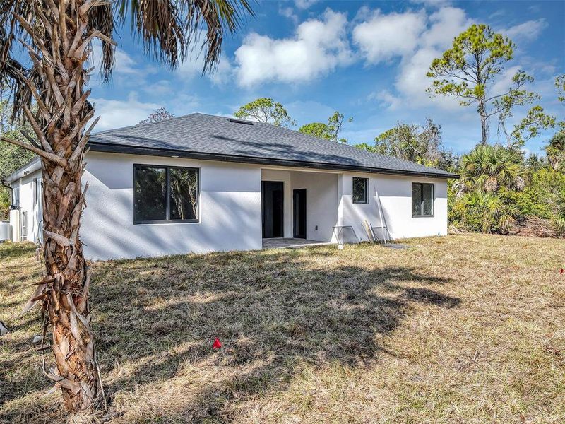 Exterior details and patio area of a home in , Port Charlotte (Image 4).