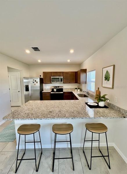 Furnished interior view inside a new home in , Haines City (Image 30).