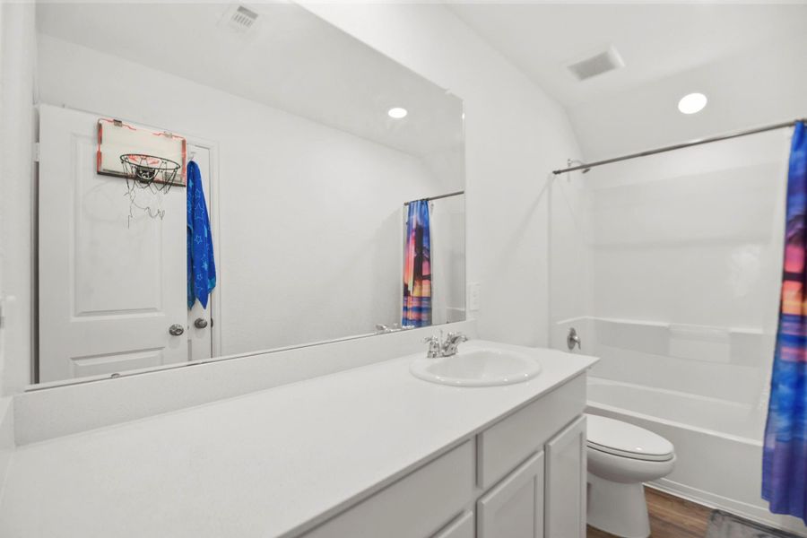 Furnished interior view inside a new home in , Conroe (Image 24).