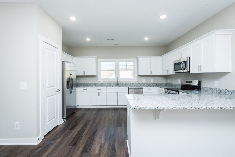 Representative furnished interior of a home built from the Ford by Foundation Home Builders LLC in Pallini Place, Ossipee (Image 9).