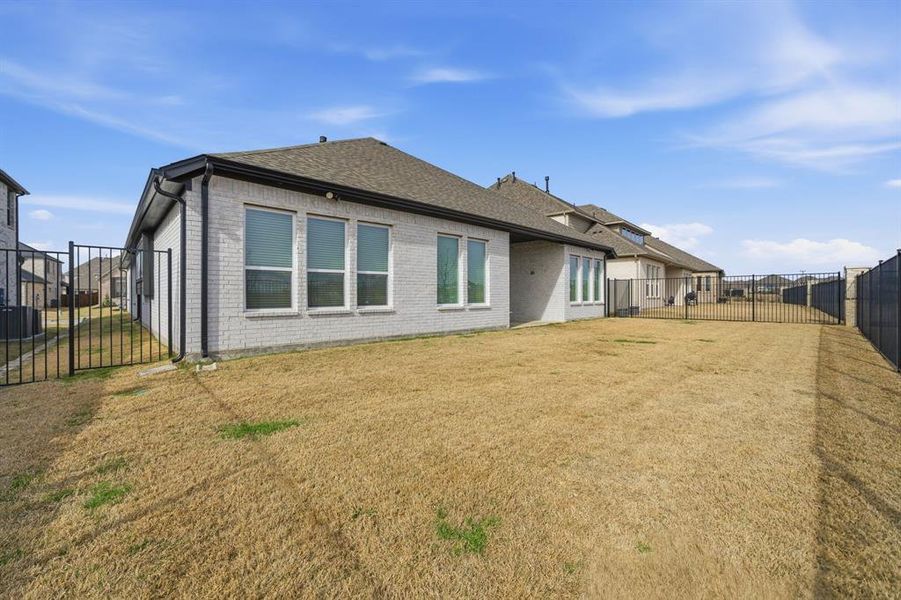 Exterior details and patio area of a home in Gideon Grove, Rockwall (Image 26).