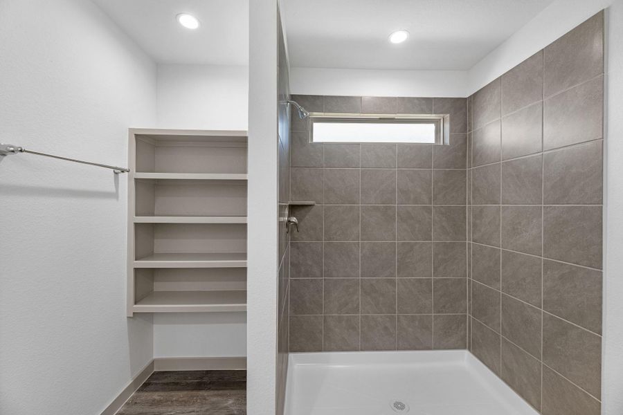 Furnished interior view inside a new home in Watermark, Alvin (Image 9).