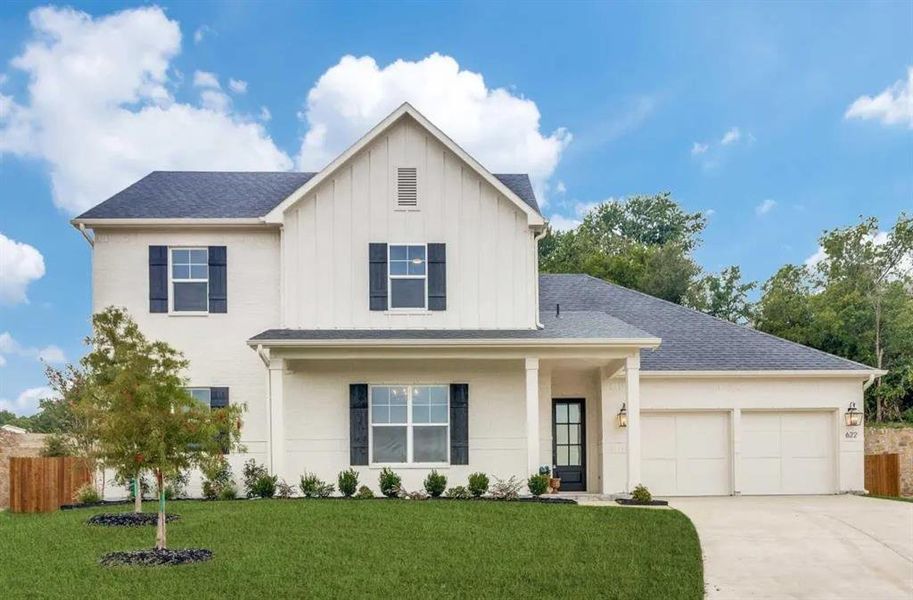 Modern farmhouse with a garage, concrete driveway, roof with shingles, covered porch, and board and batten siding