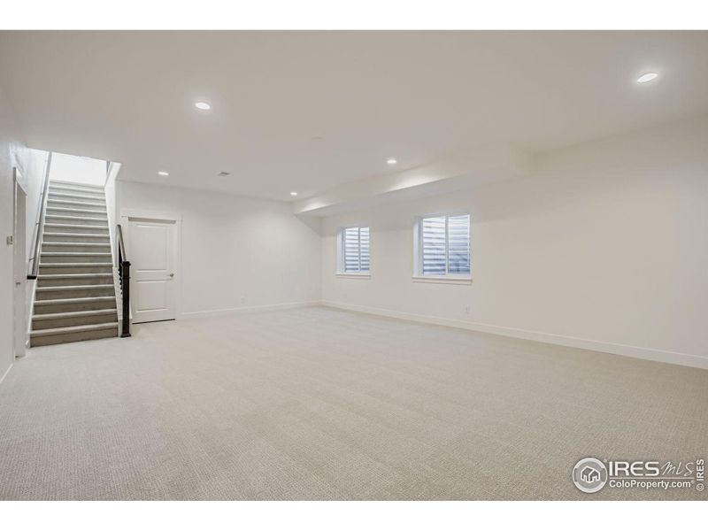 Spacious, unfurnished interior of a new home in RainDance - 60s, Windsor (Image 23).