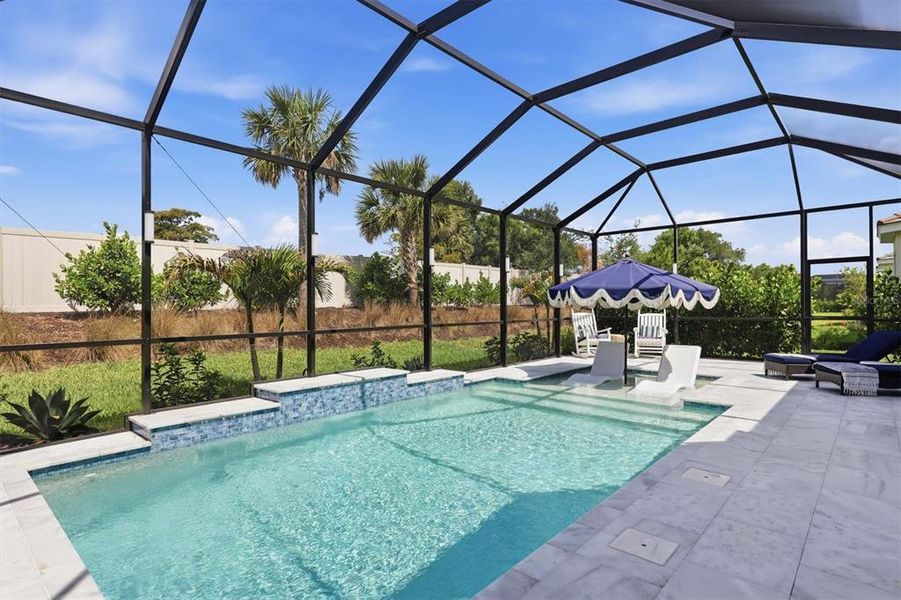 Exterior details and patio area of a home in Esplanade at Azario Lakewood Ranch, Bradenton (Image 27).