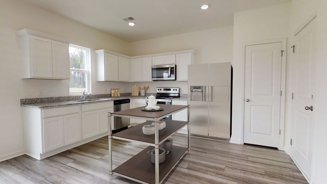 Representative furnished interior of a home built from the Copernicus by Starlight Homes in The Summit at Carters Station, Columbia (Image 3).