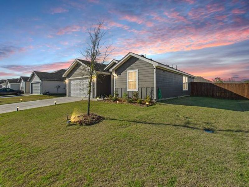 Exterior details and patio area of a home in Corsicana Commons, Corsicana (Image 4).