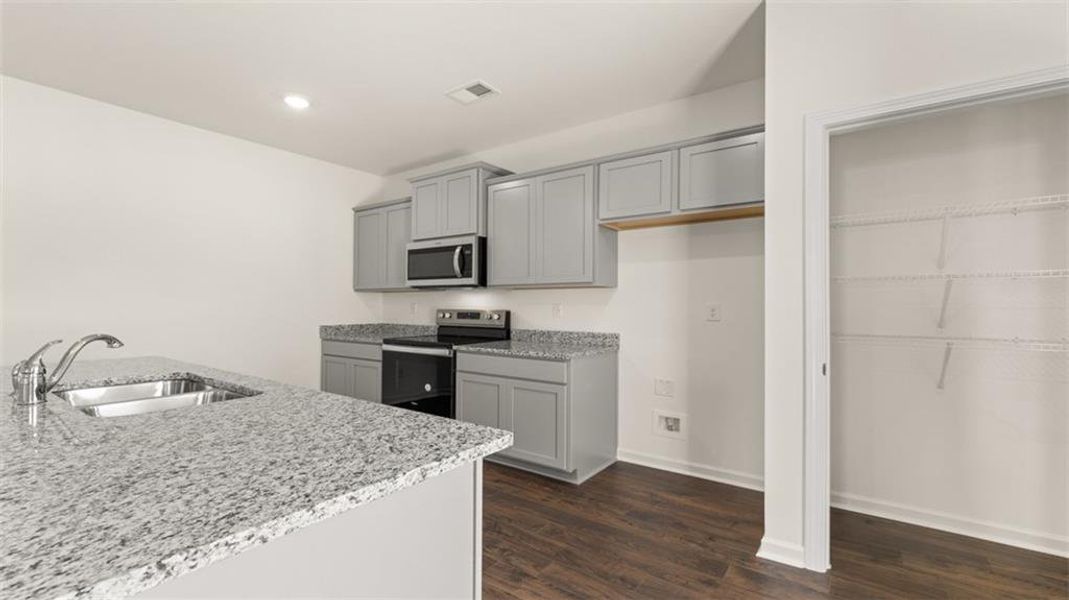 Furnished interior view inside a new home in Champion's Run, Lithonia (Image 6).